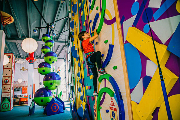 kid climbing wall.jpeg