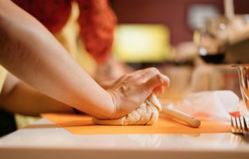 kneading pizza dough