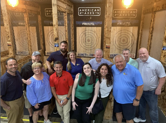 large group at axe throwing place