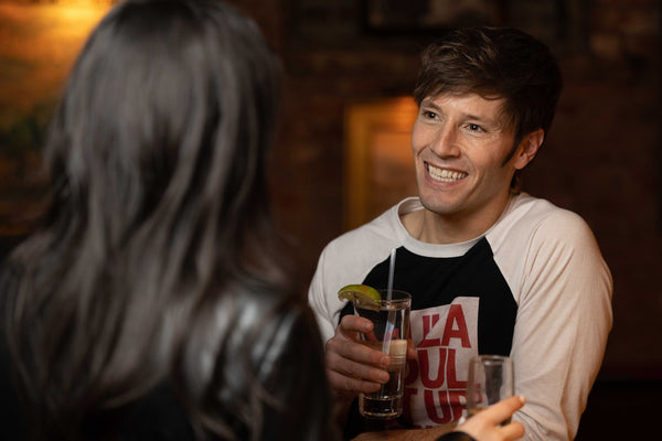 man and woman with drinks