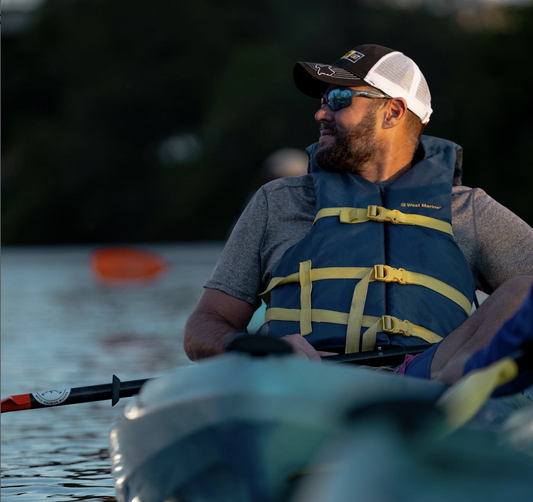 couple with paddles