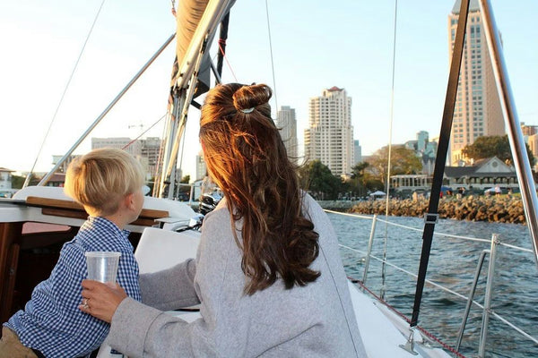 mother and son on yacht