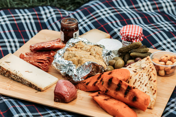 family enjoying picnic together