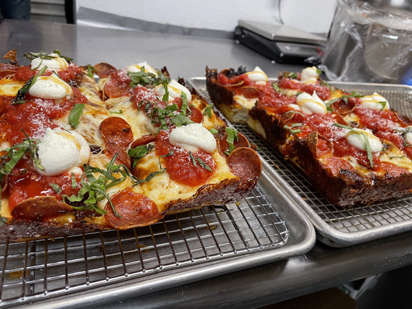 pizzas on pans