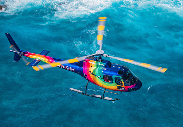 rainbow helicopter over water