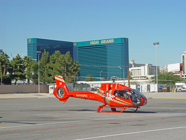 red helicopter landing