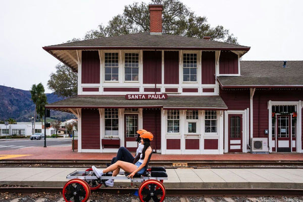 couple on railbikes