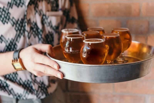 samples of beer on a tray