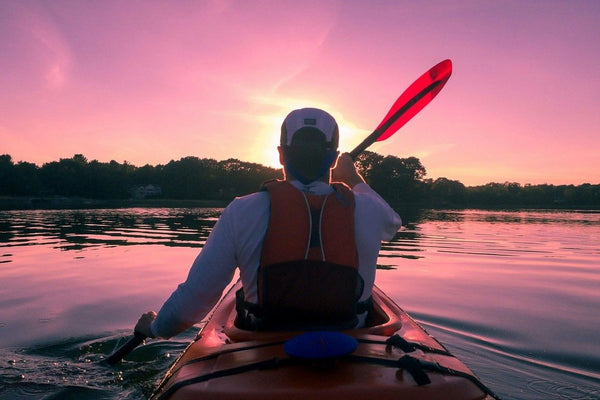 single kayak at sunrise