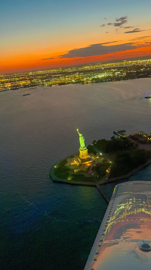 statue of liberty at sunset