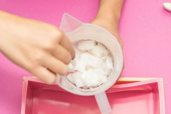 girl cutting soap