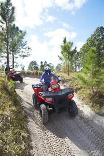 couple with atv