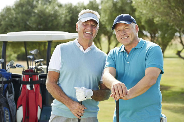 two men with golf cart