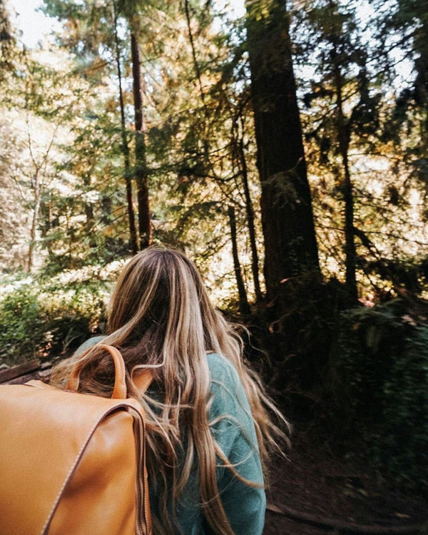 woman with backpack hiking