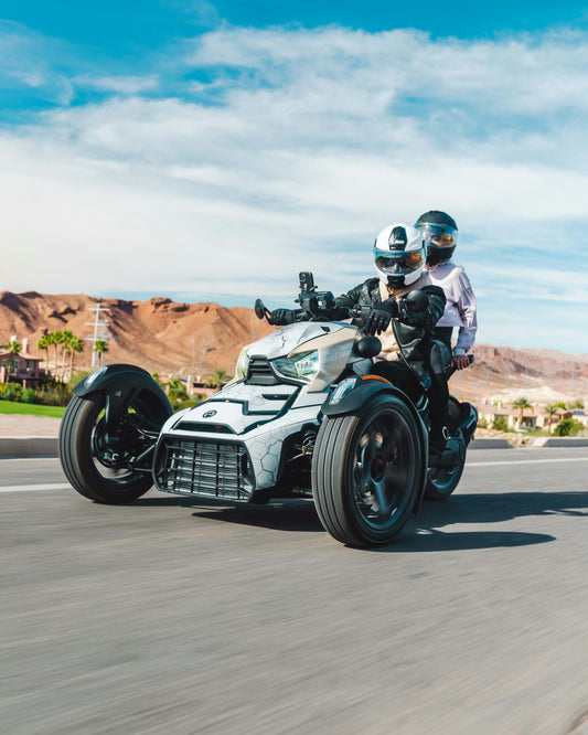 2 people on motor bike